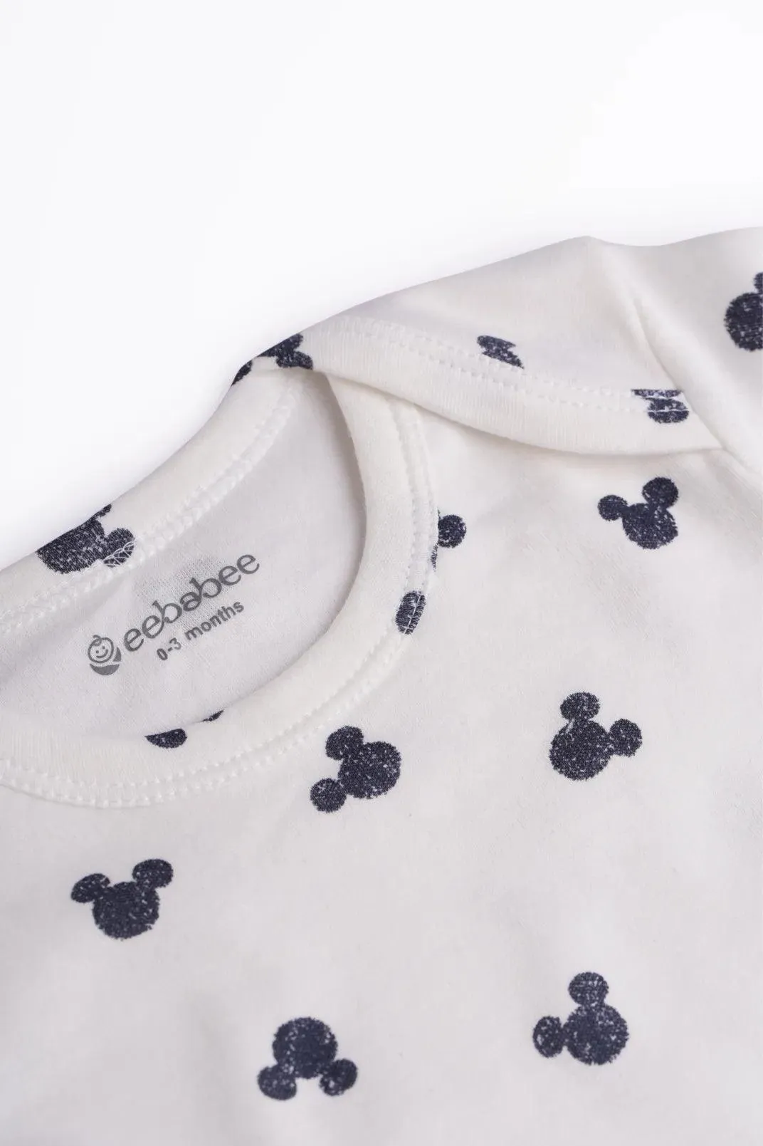 Half sleeve mickey mouse pattern in white bodysuit for baby