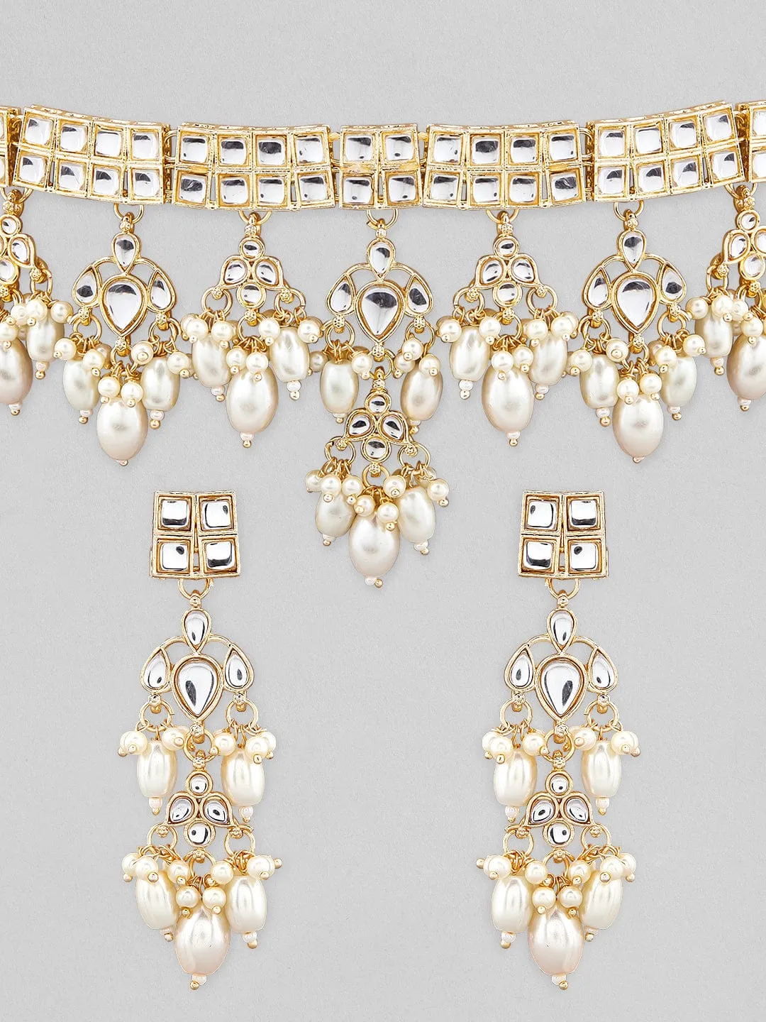 Rubans Gold Plated Kundan Choker Set Studded With Stones And Pearls.